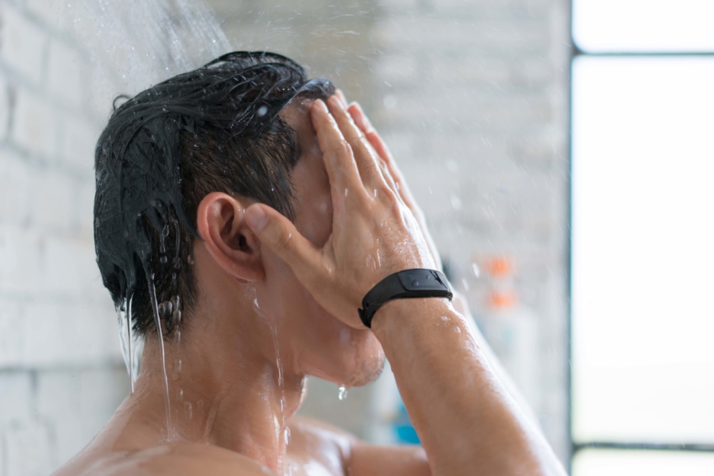 Man wearing ReadiBand in shower